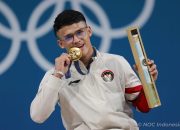 Rizki Juniansyah Bawa Emas Kedua Indonesia di Olimpiade 2024, Pecahkan Rekor Clean and Jerk